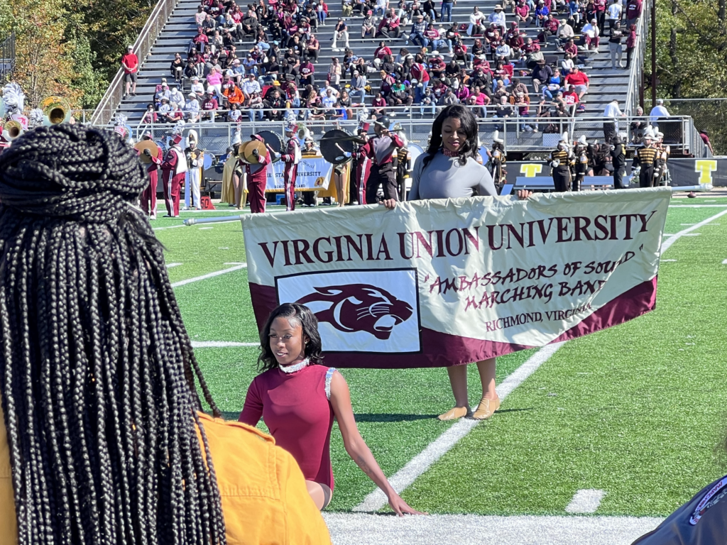 Virginia Union University Band holding banner